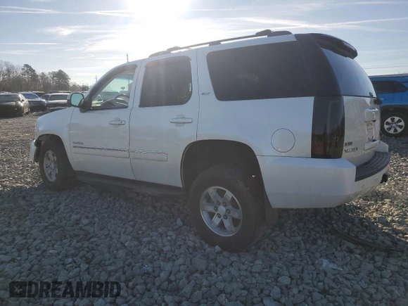 2012 GMC Yukon SLT with VIN 1GKS1CE03CR100582, listed as a Copart auction lot 44990745 with 146,089 mi miles and Salvage Title. Bid and sale history available at carsss.com. Image 2.