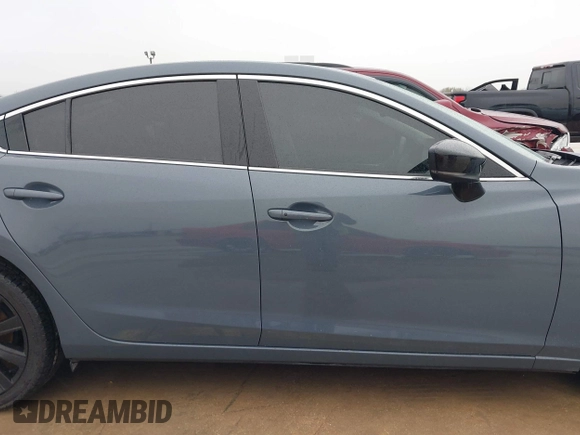 2021 Mazda 6 Carbon Edition with VIN JM1GL1WY0M1600414, listed as a IAAI auction lot 41551393 with 36,780 mi miles and . Bid and sale history available at DreamBid. Image 13.