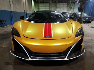 2015 McLaren 650S z VIN SBM11FAA0FW004199, wystawiony jako Copart lot #83836504 z przebiegiem 65 073 mil mil oraz Szkody całkowita. Historia ofert i sprzedaży dostępna na DreamBid. Obrazek 5.
