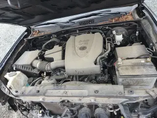 2022 Toyota Tacoma SR5 z VIN 3TMAZ5CN6NM169121, wystawiony jako Copart lot #58412475 z przebiegiem 83 911 mil mil oraz Szkoda całkowita • Salvage title. Historia ofert i sprzedaży dostępna na DreamBid. Obrazek 14.
