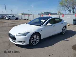 2014 Tesla Model S P85D with VIN 5YJSA1H20EFP63761, listed as a IAAI auction lot 41980472 with 109,164 mi miles and . Bid and sale history available at DreamBid. Image 19.