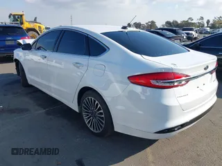 2018 Ford Fusion Titanium with VIN 3FA6P0RU0JR117158, listed as a IAAI auction lot 41435172 with 98,390 mi miles and . Bid and sale history available at DreamBid. Image 3.
