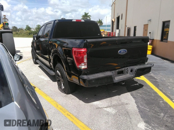 2023 Ford F-150 XL with VIN 1FTEW1C56PFC28013, listed as a IAAI auction lot 42242994 with Not provided miles and . Bid and sale history available at DreamBid. Image 3.