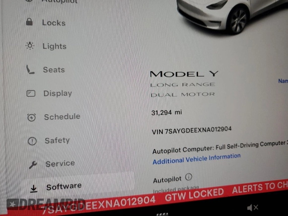 2022 Tesla Model Y Long Range z VIN 7SAYGDEEXNA012904, wystawiony jako Copart lot #57492865 z przebiegiem 31 294 mil mil oraz Szkody całkowita. Historia ofert i sprzedaży dostępna na DreamBid. Obrazek 9.