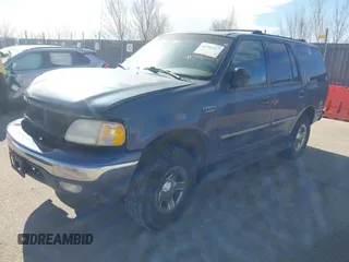 1999 Ford Expedition XLT z VIN 1FMPU18L2XLB43236, wystawiony jako IAAI lot #41792317 z przebiegiem 157 636 mil mil oraz . Historia ofert i sprzedaży dostępna na DreamBid. Obrazek 18.