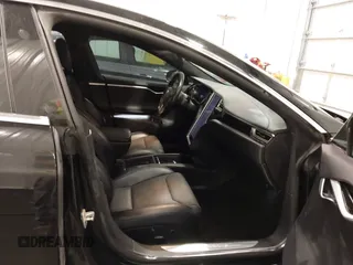 2018 Tesla Model S 75D with VIN 5YJSA1E2XJF248751, listed as a IAAI auction lot 42079081 with 75,904 mi miles and . Bid and sale history available at DreamBid. Image 5.
