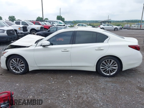 2021 Infiniti Q50 Luxe z VIN JN1EV7BR3MM751283, wystawiony jako IAAI lot #42446846 z przebiegiem 25 524 mil mil oraz . Historia ofert i sprzedaży dostępna na DreamBid. Obrazek 14.