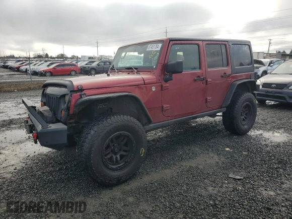 2012 Jeep Wrangler Unlimited Rubicon with VIN 1C4HJWFG2CL219021, listed as a Copart auction lot 87451784 with 109,675 mi miles and Salvage title. Bid and sale history available at DreamBid. Image 1.