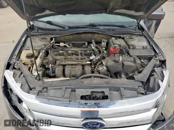2012 Ford Fusion SE z VIN 3FAHP0HAXCR436084, wystawiony jako Copart lot #57390385 z przebiegiem 88 645 mil mil oraz Szkoda całkowita • Salvage title. Historia ofert i sprzedaży dostępna na DreamBid. Obrazek 11.