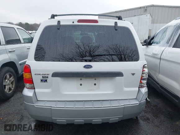 2007 Ford Escape XLT with VIN 1FMYU03197KB80133, listed as a IAAI auction lot 41084715 with 185,132 mi miles and . Bid and sale history available at DreamBid. Image 16.