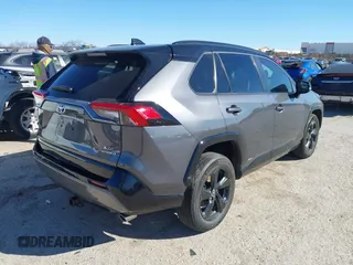 2021 Toyota RAV4 Hybrid XSE with VIN 4T3E6RFV5MU057078, listed as a IAAI auction lot 41718381 with 65,797 mi miles. Bid and sale history available at carsss.com. Image 4.
