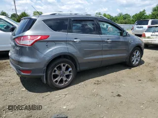 2014 Ford Escape Titanium with VIN 1FMCU9J91EUC90702, listed as a Copart auction lot 59116194 with 117,984 mi miles and Salvage Title. Bid and sale history available at DreamBid. Image 3.