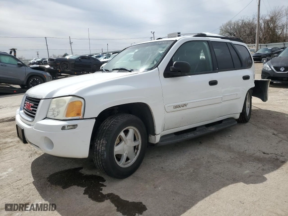 2003 GMC Envoy SLE with VIN 1GKDS13SX32259798, listed as a Copart auction lot 48712015 with 100,330 mi miles and Salvage Title. Bid and sale history available at carsss.com. Image 1.