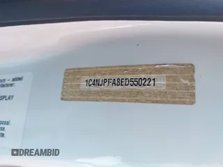 2014 Jeep Patriot Latitude with VIN 1C4NJPFA8ED550221, listed as a IAAI auction lot 41919419 with 185,386 mi miles and . Bid and sale history available at carsss.com. Image 9.