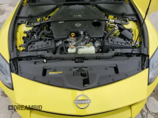 2023 Nissan Z Sport z VIN JN1BZ4AH0PM310987, wystawiony jako Copart lot #74926264 z przebiegiem 10 474 mil mil oraz Szkody całkowita. Historia ofert i sprzedaży dostępna na DreamBid. Obrazek 11.