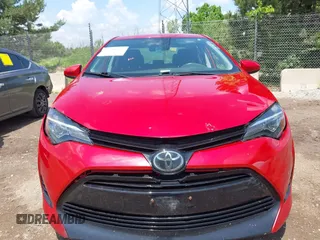 2018 Toyota Corolla L with VIN 2T1BURHE7JC105479, listed as a IAAI auction lot 42540566 with 67,487 mi miles and . Bid and sale history available at DreamBid. Image 12.