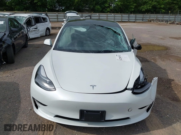 2023 Tesla Model 3 with VIN 5YJ3E1EA4PF644621, listed as a IAAI auction lot 42280312 with 41,262 mi miles and . Bid and sale history available at DreamBid. Image 12.