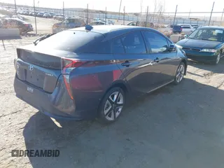 2017 Toyota Prius Two z VIN JTDKARFU4H3543978, wystawiony jako IAAI lot #41749905 z przebiegiem 105 151 mil mil oraz . Historia ofert i sprzedaży dostępna na DreamBid. Obrazek 4.