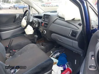 2002 Suzuki Aerio SX z VIN JS2RC41H825105469, wystawiony jako IAAI lot #41829735 z przebiegiem Nie podano mil oraz . Historia ofert i sprzedaży dostępna na DreamBid. Obrazek 5.