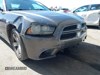 2013 Dodge Charger SE with VIN 2C3CDXBGXDH688230, listed as a IAAI auction lot 41634325 with 133,519 mi miles. Bid and sale history available at carsss.com. Image 6.
