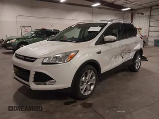 2016 Ford Escape Titanium with VIN 1FMCU9J99GUA61848, listed as a IAAI auction lot 42300324 with 51,692 mi miles and . Bid and sale history available at DreamBid. Image 18.