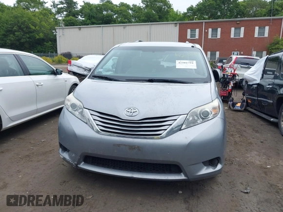 2015 Toyota Sienna LE AAS with VIN 5TDKK3DC0FS588089, listed as a IAAI auction lot 42501791 with 190,322 mi miles and . Bid and sale history available at DreamBid. Image 13.