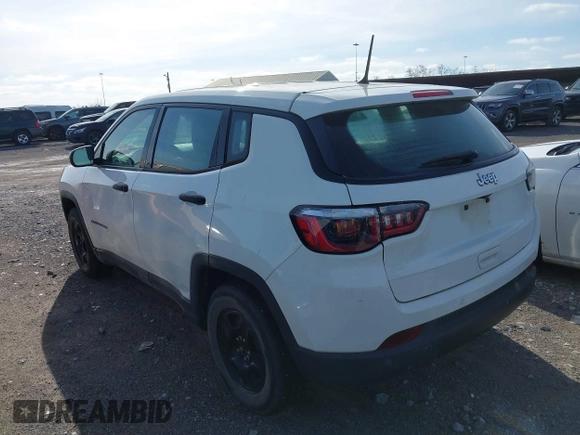 2018 Jeep Compass Sport with VIN 3C4NJCABXJT263332, listed as a IAAI auction lot 41554259 with 91,156 mi miles and . Bid and sale history available at DreamBid. Image 3.