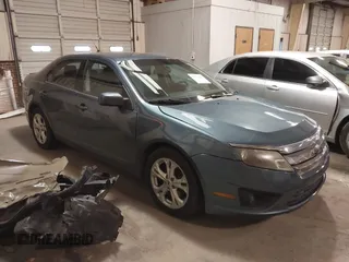2012 Ford Fusion SE with VIN 3FAHP0HA4CR371748, listed as a IAAI auction lot 41621960 with 155,995 mi miles. Bid and sale history available at carsss.com. Image 1.