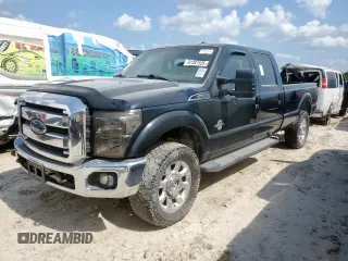 2014 Ford F-350 XLT z VIN 1FT8W3BT6EEA02890, wystawiony jako Copart lot #61381525 z przebiegiem 266 801 mil mil oraz Czysty tytuł • Clean title. Historia ofert i sprzedaży dostępna na DreamBid. Obrazek 1.