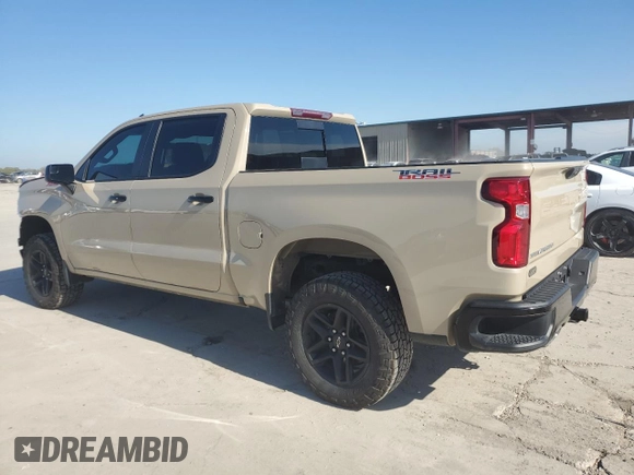 2022 Chevrolet Silverado 1500 LT Trail Boss with VIN 3GCUDFET0NG580297, listed as a Copart auction lot 80829184 with 64,717 mi miles and Salvage Title. Bid and sale history available at DreamBid. Image 2.