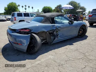 2018 Porsche 718 Boxster z VIN WP0CA2A83JS210673, wystawiony jako Copart lot #64289503 z przebiegiem 43 663 mil mil oraz . Historia ofert i sprzedaży dostępna na DreamBid. Obrazek 3.