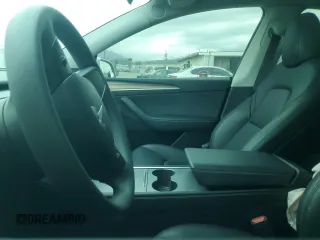 2023 Tesla Model Y Performance z VIN 7SAYGDEFXPF801908, wystawiony jako Copart lot #50737655 z przebiegiem Nie podano mil oraz Szkoda całkowita • Salvage title. Historia ofert i sprzedaży dostępna na DreamBid. Obrazek 7.