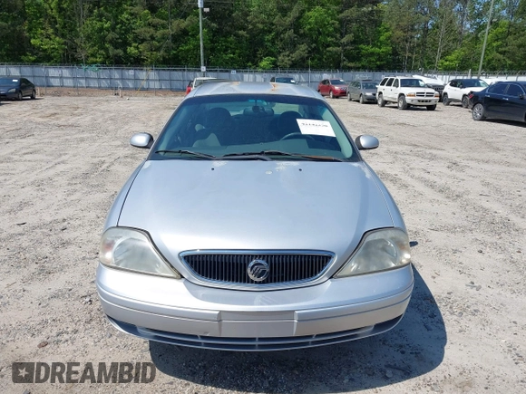 2003 Mercury Sable GS z VIN 1MEFM50213A611357, wystawiony jako IAAI lot #42142256 z przebiegiem 170 396 mil mil oraz . Historia ofert i sprzedaży dostępna na DreamBid. Obrazek 6.