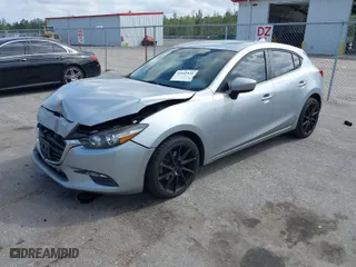 2018 Mazda Mazda3 5-Door Touring with VIN 3MZBN1L35JM194266, listed as a IAAI auction lot 41649431 with 83,122 mi miles. Bid and sale history available at carsss.com. Image 2.