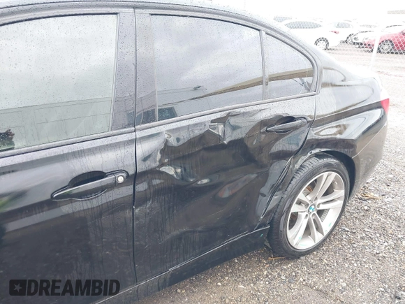 2013 BMW 3 Series 328i with VIN WBA3A5C56DF453232, listed as a IAAI auction lot 41794450 with 152,304 mi miles. Bid and sale history available at carsss.com. Image 6.