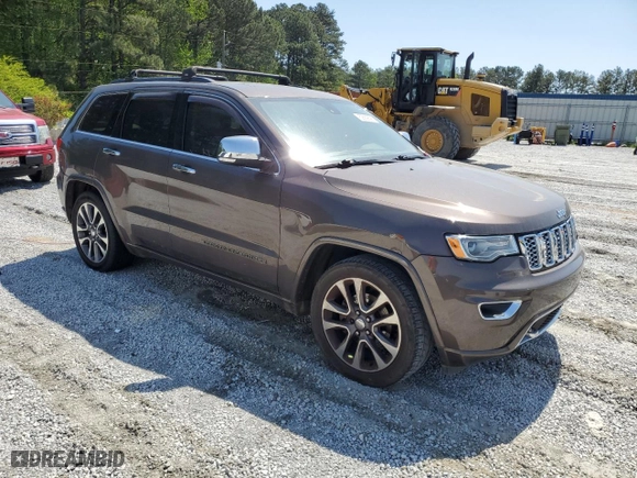 2017 Jeep Grand Cherokee Overland with VIN 1C4RJECG1HC868559, listed as a Copart auction lot 52569595 with 168,226 mi miles and Clean Title. Bid and sale history available at carsss.com. Image 4.