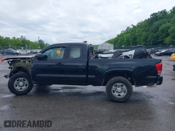 2018 Toyota Tacoma SR with VIN 5TFSX5EN1JX062523, listed as a IAAI auction lot 42334816 with 56,994 mi miles and . Bid and sale history available at DreamBid. Image 14.