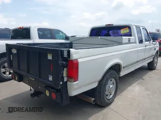 1996 Ford F-250 with VIN 1FTHX25F4TEB61031, listed as a IAAI auction lot 42055061 with 338,618 mi miles. Bid and sale history available at carsss.com. Image 4.