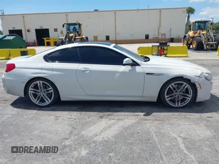 2014 BMW 6 Series 650i with VIN WBAYM9C55ED248244, listed as a IAAI auction lot 42043456 with 144,664 mi miles and . Bid and sale history available at DreamBid. Image 13.