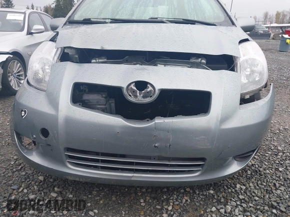 2007 Toyota Yaris with VIN JTDJT923175119695, listed as a IAAI auction lot 41933229 with 133,146 mi miles. Bid and sale history available at carsss.com. Image 6.