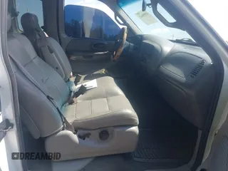 2001 Ford F-150 XL with VIN 1FTRX18L71NB11026, listed as a IAAI auction lot 42590063 with 218,156 mi miles and . Bid and sale history available at DreamBid. Image 5.
