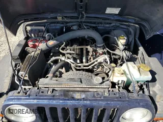 2005 Jeep Wrangler Rubicon with VIN 1J4FA69S05P351725, listed as a Copart auction lot 71411904 with 144,557 mi miles and Salvage Title. Bid and sale history available at carsss.com. Image 11.