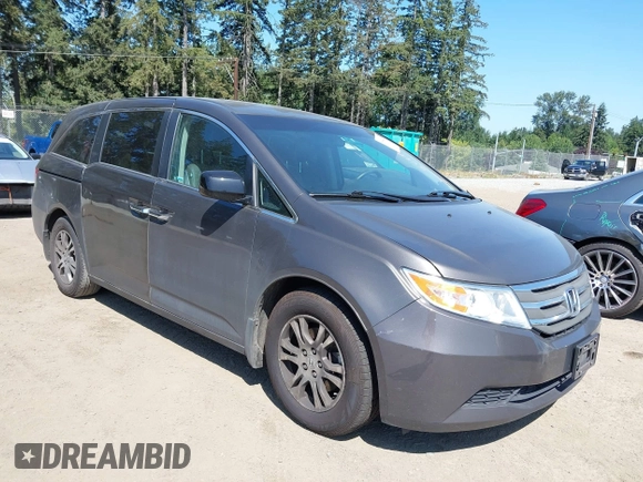 2012 Honda Odyssey EX-L with VIN 5FNRL5H64CB127523, listed as a IAAI auction lot 39818448 with 102,514 mi miles and . Bid and sale history available at DreamBid. Image 1.