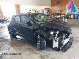 2019 Toyota C-HR XLE with VIN NMTKHMBX9KR078696, listed as a IAAI auction lot 39827333 with 27,840 mi miles. Bid and sale history available at carsss.com. Image 1.
