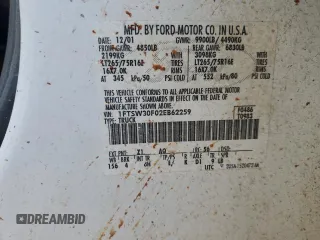 2002 Ford F-350 XL with VIN 1FTSW30F02EB62259, listed as a Copart auction lot 44232015 with 507,871 mi miles and Salvage Title. Bid and sale history available at DreamBid. Image 12.