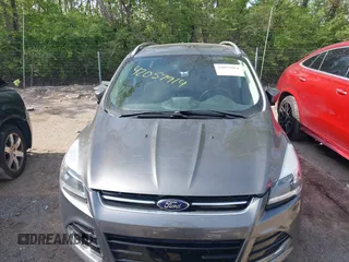 2014 Ford Escape Titanium with VIN 1FMCU9J98EUB66961, listed as a IAAI auction lot 42057914 with 101,943 mi miles. Bid and sale history available at carsss.com. Image 6.