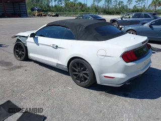 2019 Ford Mustang EcoBoost z VIN 1FATP8UHXK5205196, wystawiony jako IAAI lot #41688651 z przebiegiem 75 642 mil mil oraz . Historia ofert i sprzedaży dostępna na DreamBid. Obrazek 3.