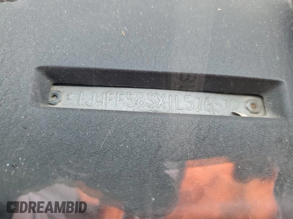 2001 Jeep Cherokee Sport z VIN 1J4FF58SX1L576572, wystawiony jako Copart lot #48982965 z przebiegiem 174 500 mil mil oraz Szkoda całkowita • Salvage title. Historia ofert i sprzedaży dostępna na DreamBid. Obrazek 15.