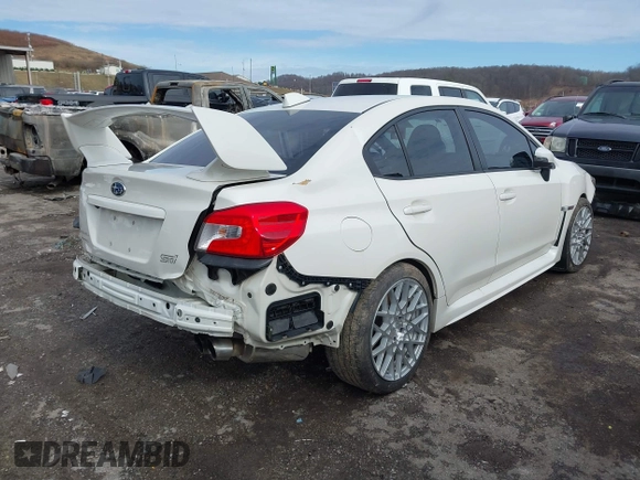 2016 Subaru WRX STI with VIN JF1VA2V63G9818135, listed as a IAAI auction lot 41465148 with 52,000 mi miles and . Bid and sale history available at DreamBid. Image 4.