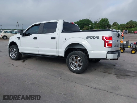 2018 Ford F-150 XL with VIN 1FTEW1E54JFB51565, listed as a IAAI auction lot 41942276 with 131,864 mi miles. Bid and sale history available at carsss.com. Image 3.
